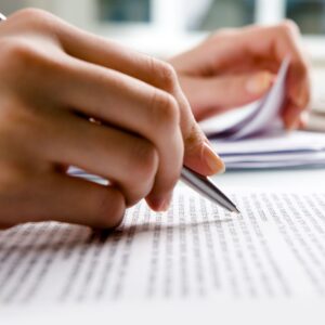 img of someone looking at paperwork