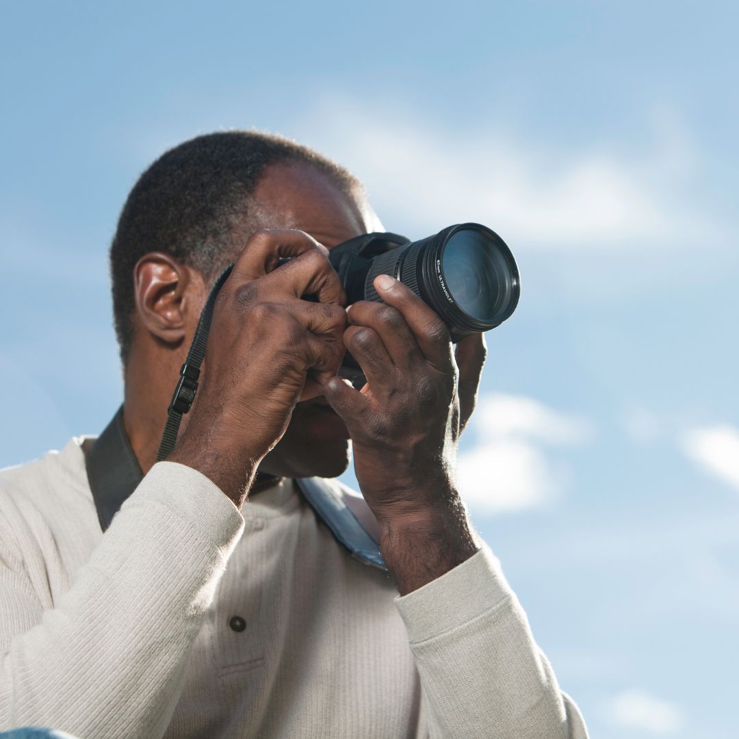 man taking a photo