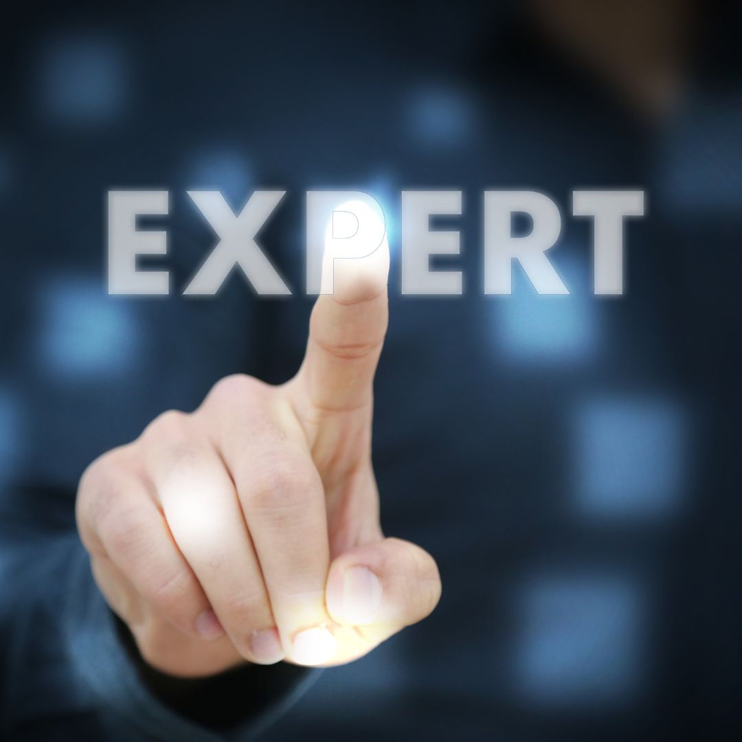 person pushing expert button