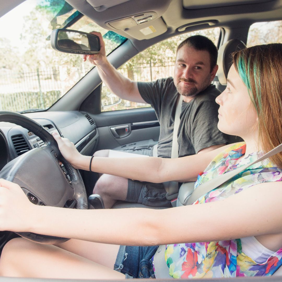 Young girl learning how to drive