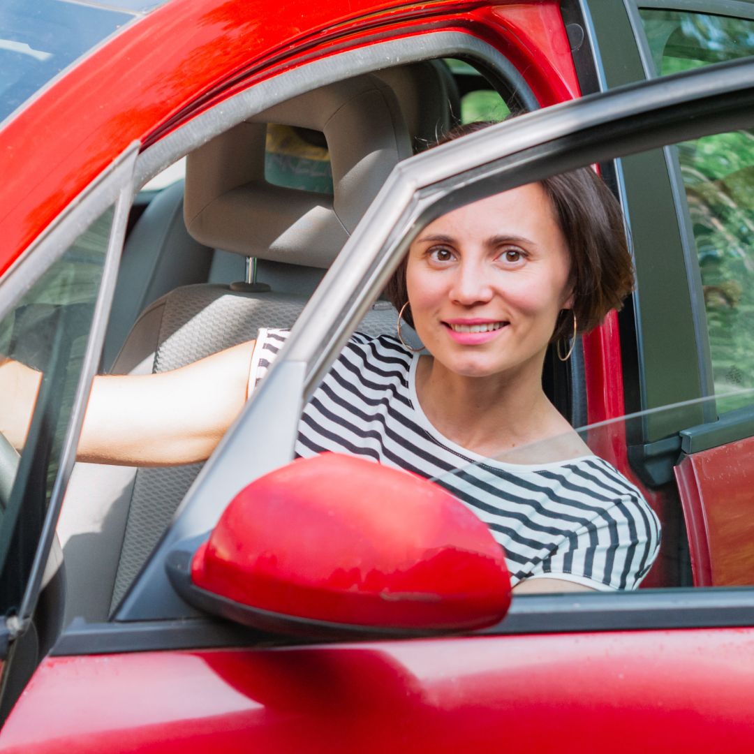 Woman getting into her car