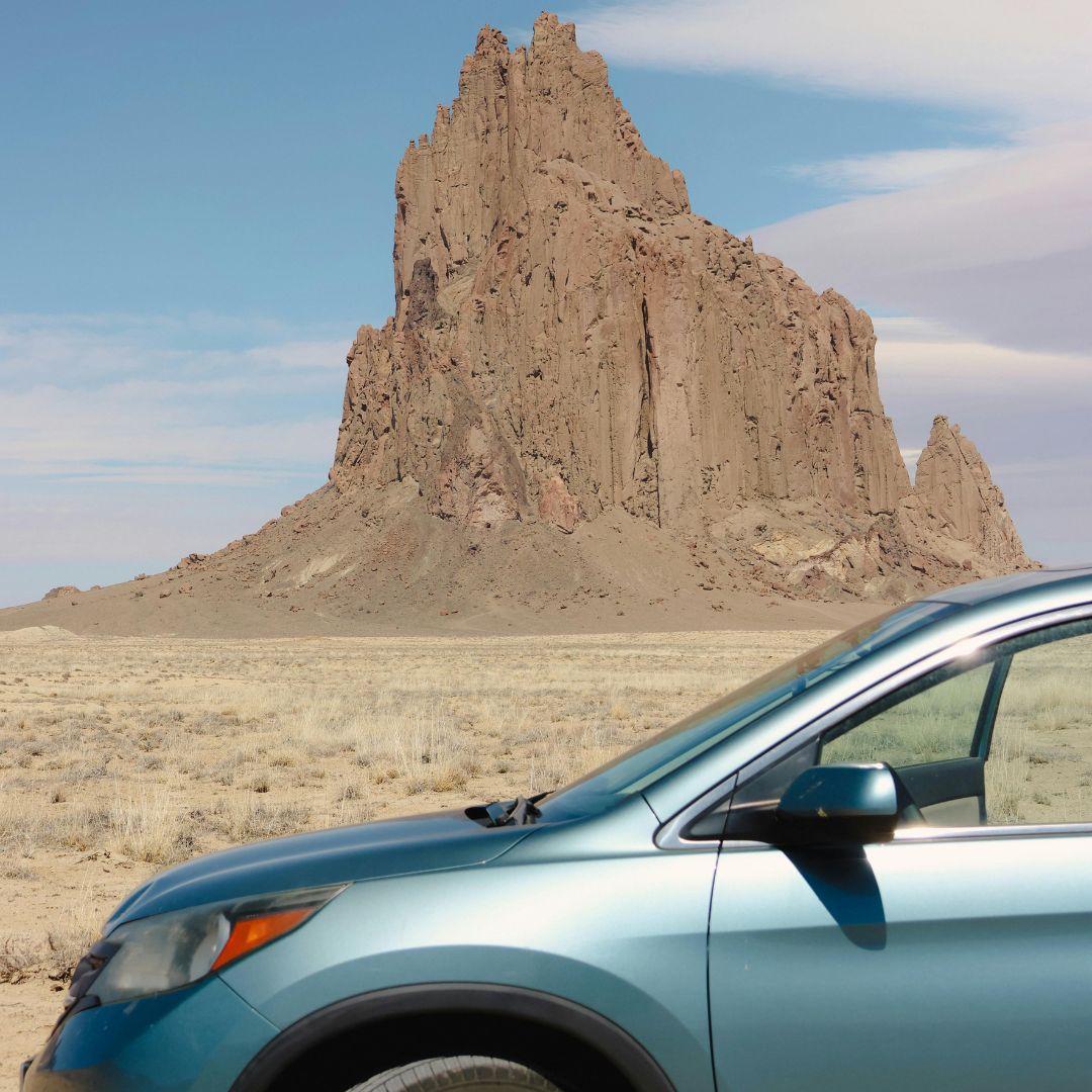 Car parked along road in New Mexico