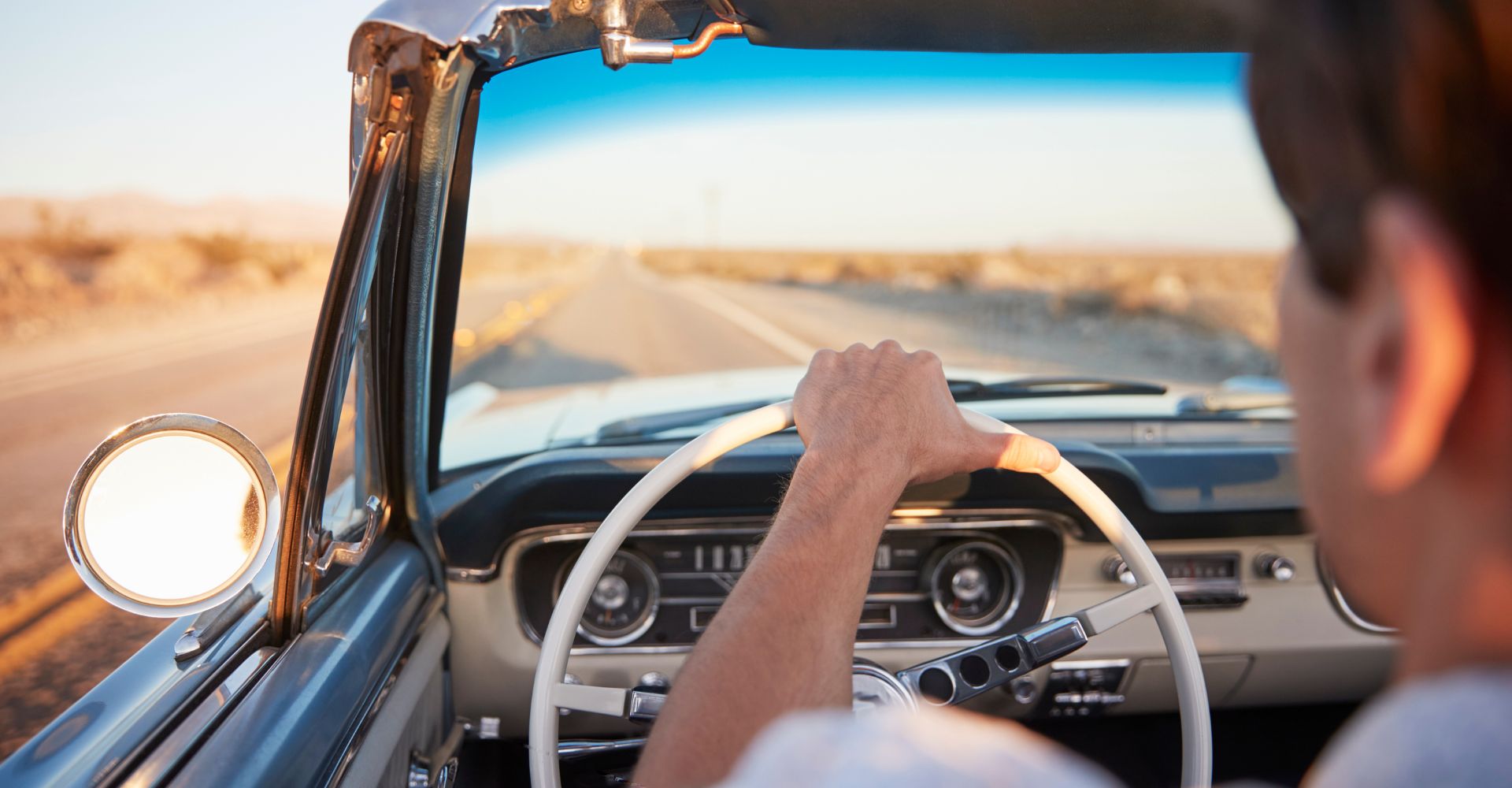 Man cruising along road