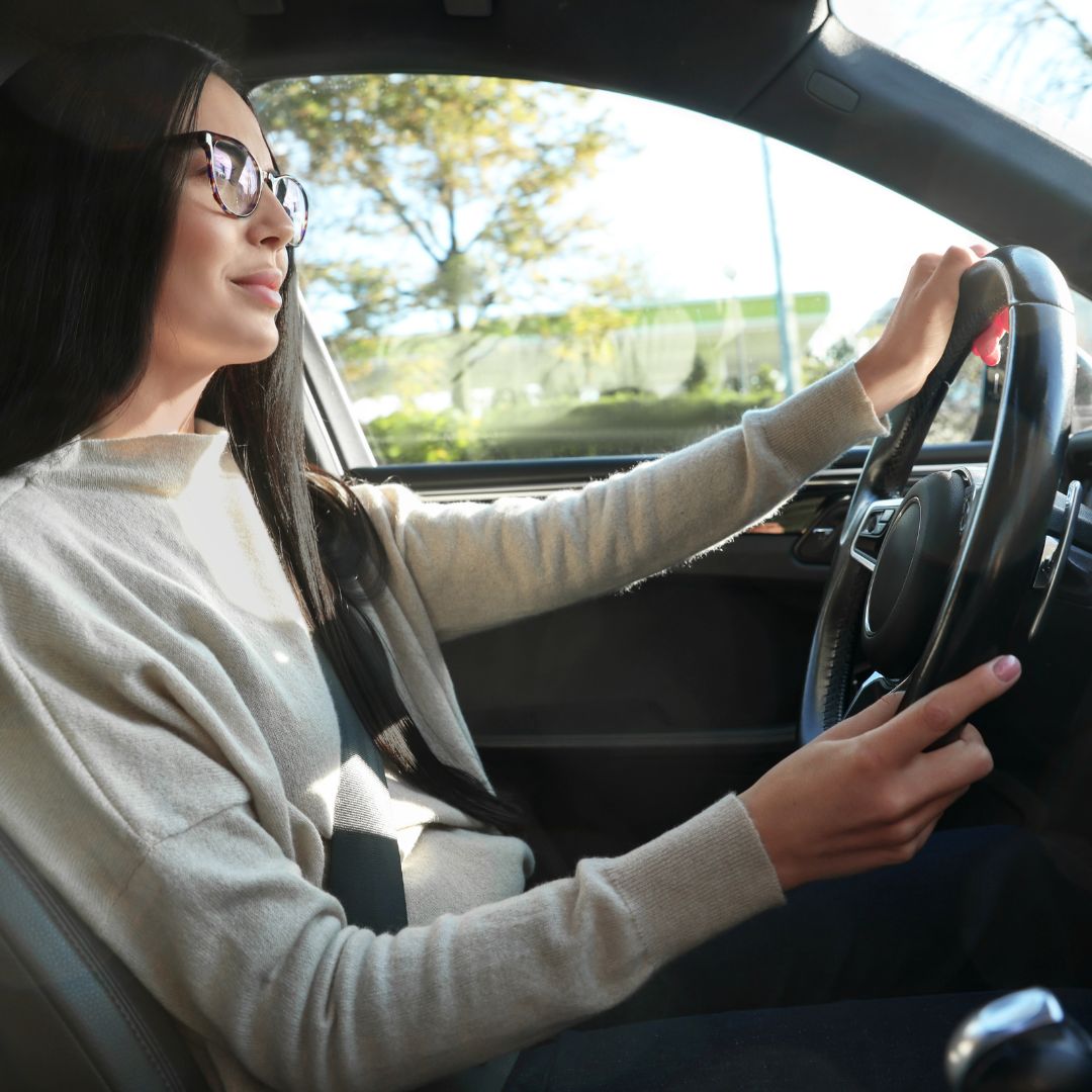 Young woman behind the wheel